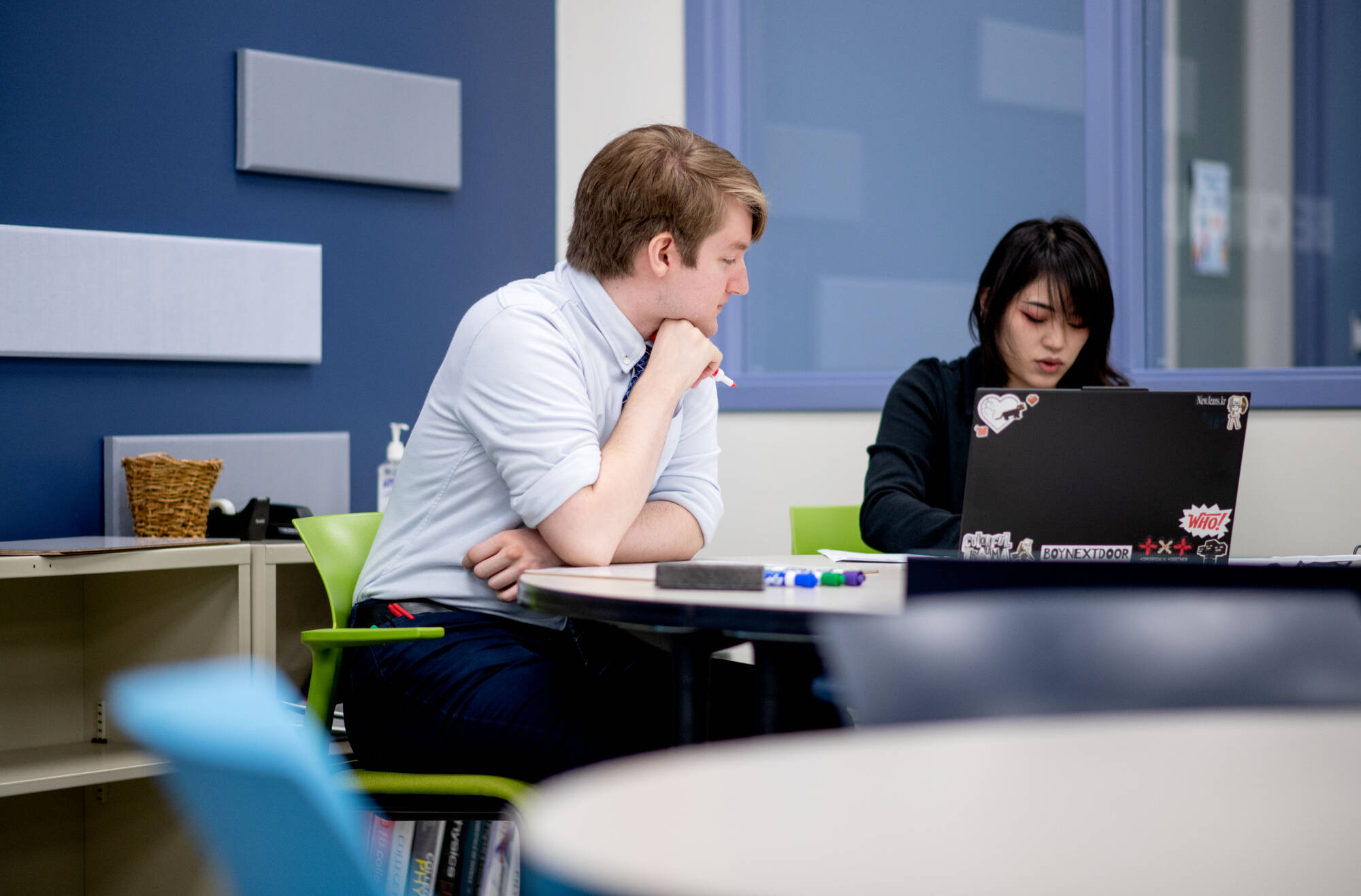 Benjamin Brown, left, tutors Leeza Souvongkham, right,  in physics in the new Tutoring and Reading Center in Henry Hall September 27.(Photo releases on file)